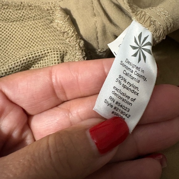 Woman’s Athleta Nylon Tan Cargo Pants. 
Zipper, snap waist and drawstring. - Picture 7 of 16